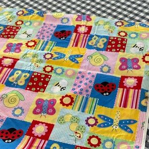 Colorful Patchwork Fabric with Butterflies and Ladybugs